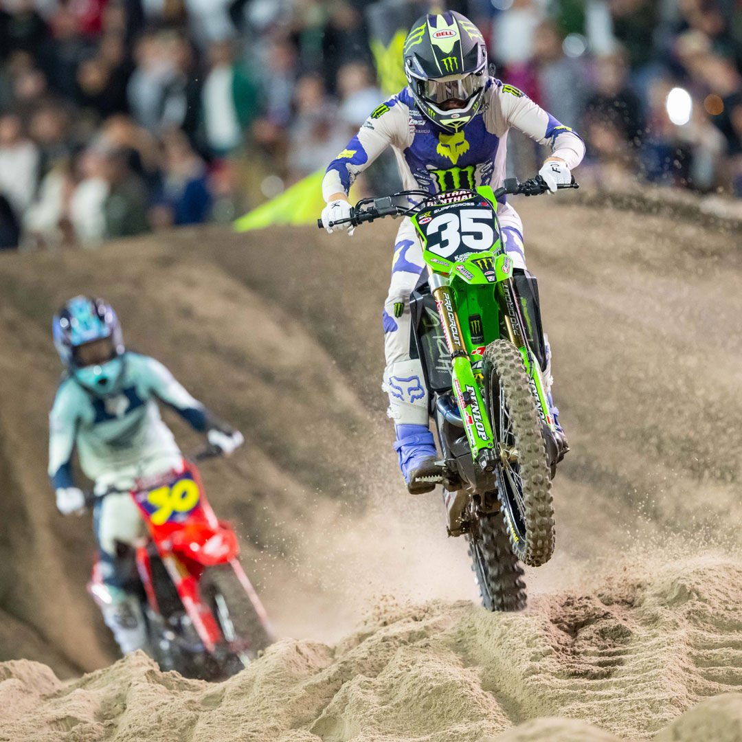 athlete riding a dirtbike wearing Fox awareness kit