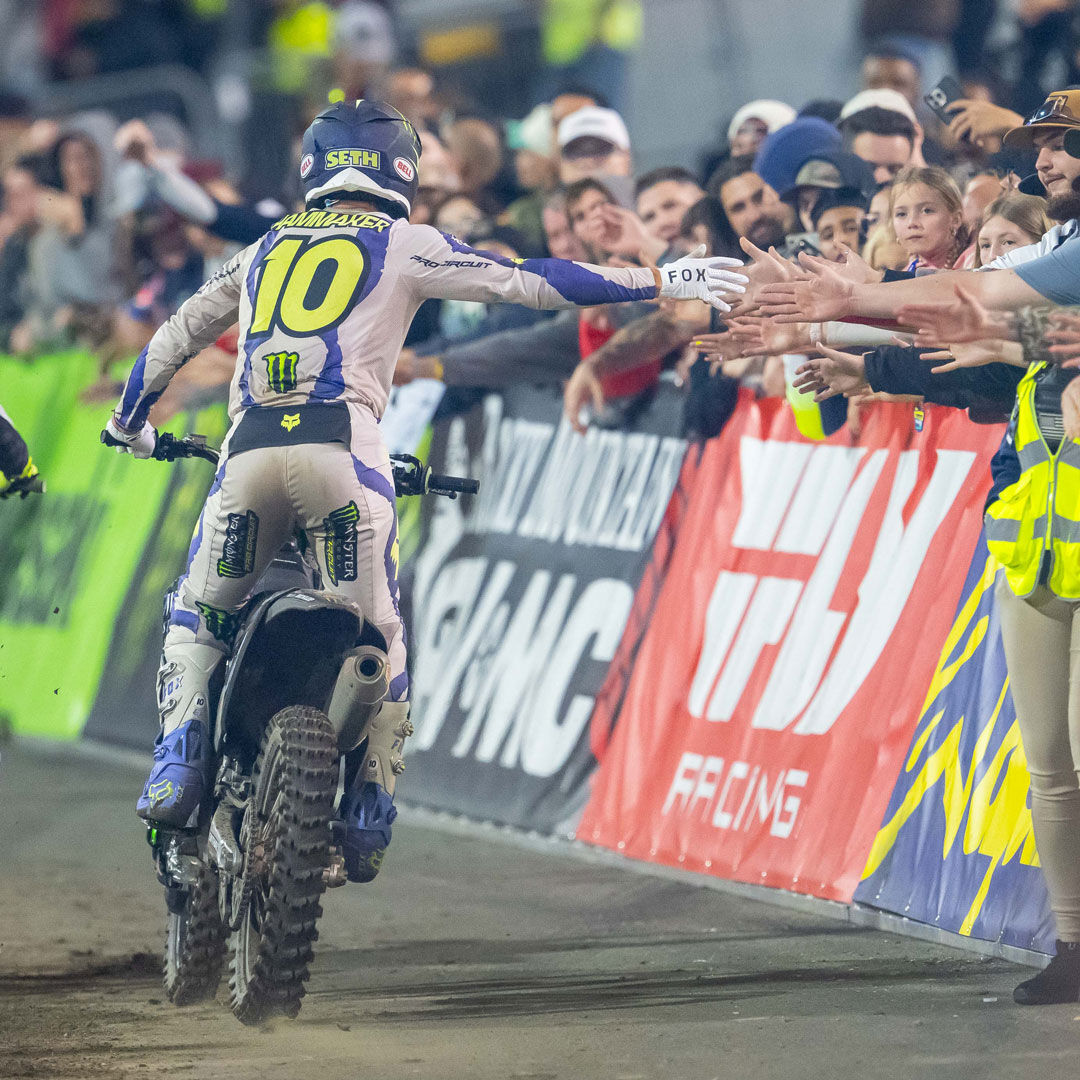 Seth Hammaker in Fox Awareness Kit high fiving fans