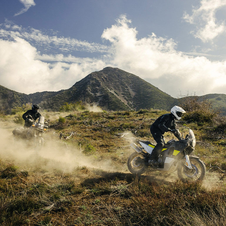 adventure motorcycle riders on a trail